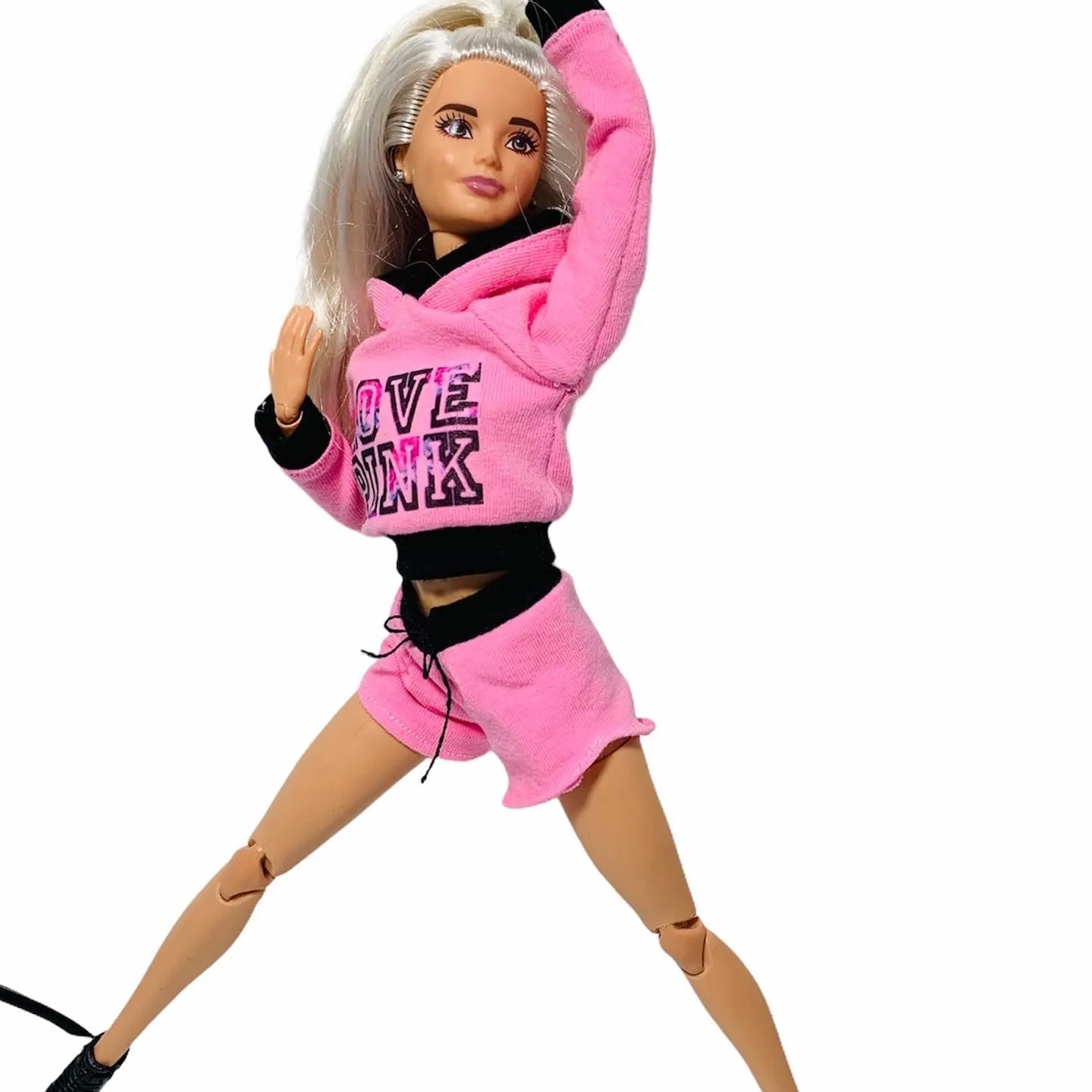 Pink shorts and hoodie for Barbie doll